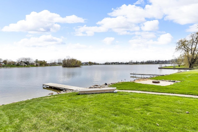 9015 Kingsley Dr, Onsted, MI 49265 - dock area with a lawn and a water view