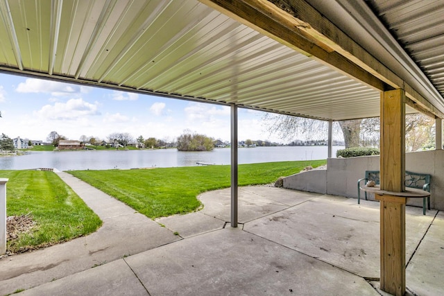 9015 Kingsley Dr, Onsted, MI 49265 - view of patio / terrace featuring a water view