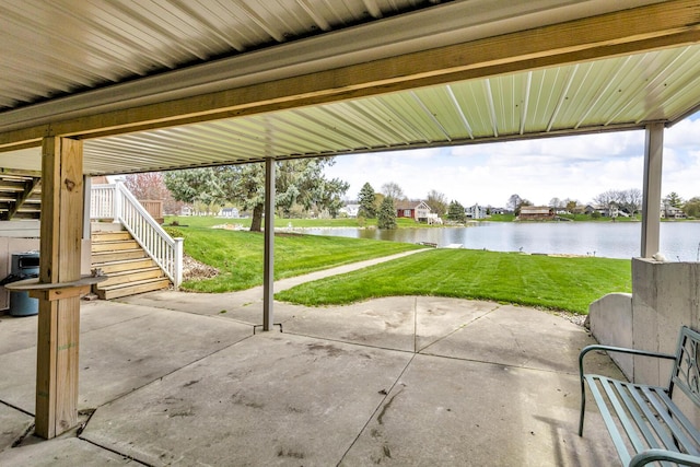 9015 Kingsley Dr, Onsted, MI 49265 - view of patio with stairs and a water view