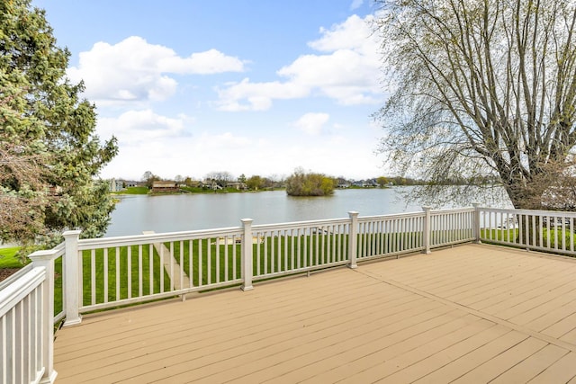 9015 Kingsley Dr, Onsted, MI 49265 - wooden terrace with a lawn and a water view