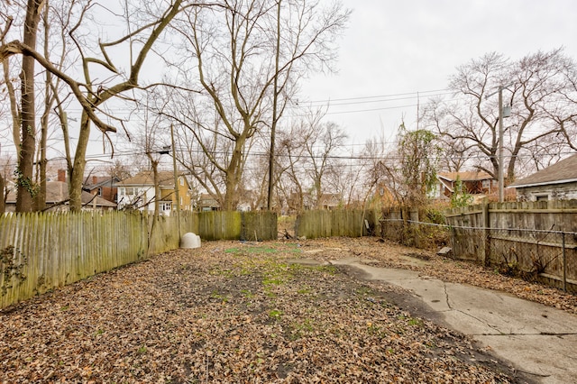 849 Chalmers St, Detroit, MI 48215 - view of yard featuring a residential view and fence