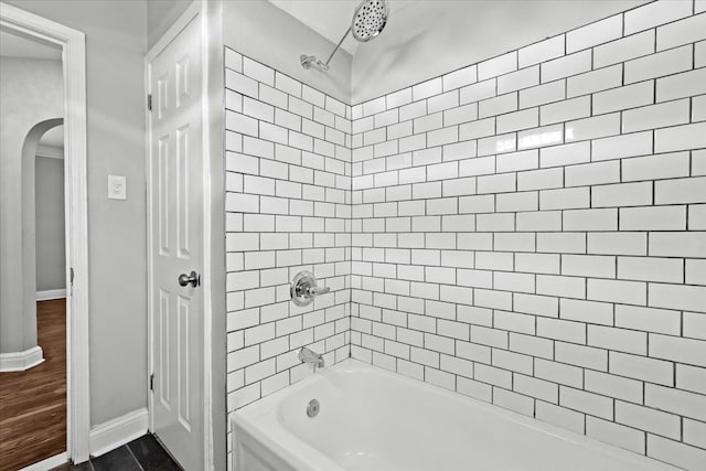 18603 Monica St, Detroit, MI 48221 - bathroom with baseboards, wood finished floors, and shower / bathing tub combination