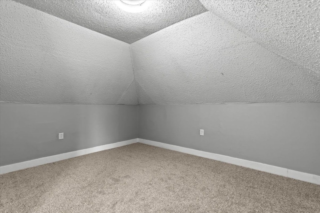 18603 Monica St, Detroit, MI 48221 - additional living space featuring lofted ceiling, carpet flooring, and baseboards