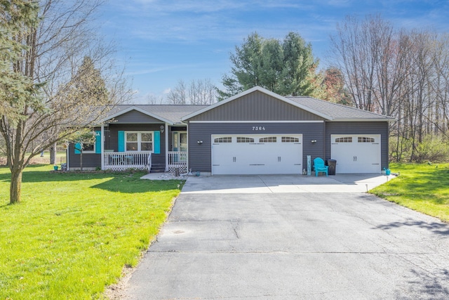 7364 Regency Ln, Canadian Lakes, MI 49346 - ranch-style home featuring a garage, aphalt driveway, covered porch, and a front yard