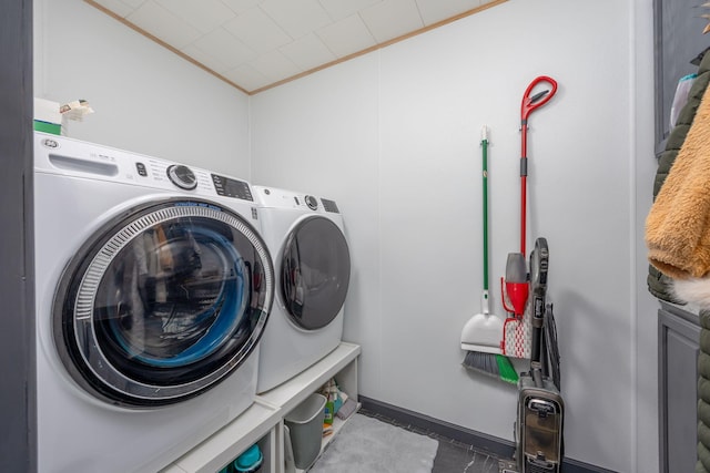 7364 Regency Ln, Canadian Lakes, MI 49346 - laundry area with laundry area, crown molding, and washing machine and dryer