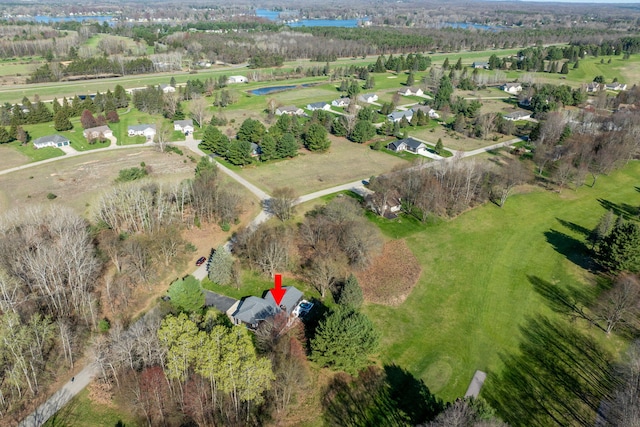 7364 Regency Ln, Canadian Lakes, MI 49346 - bird's eye view featuring a water view and a residential view