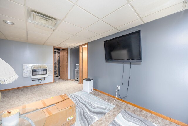 7364 Regency Ln, Canadian Lakes, MI 49346 - carpeted bedroom with heating unit, baseboards, a drop ceiling, and visible vents