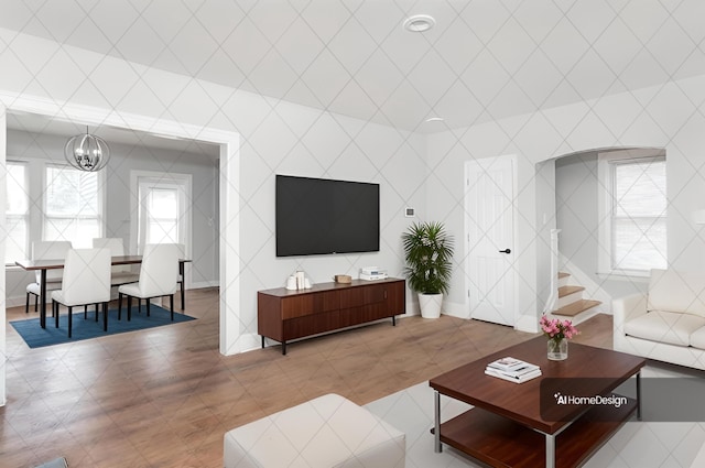 living area with an inviting chandelier