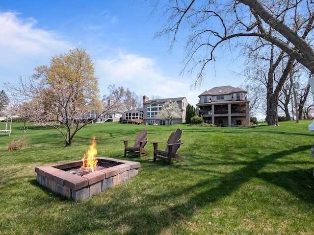 3190 Edgewood Park Dr, Commerce Twp, MI 48382 - view of home's community featuring a fire pit and a yard