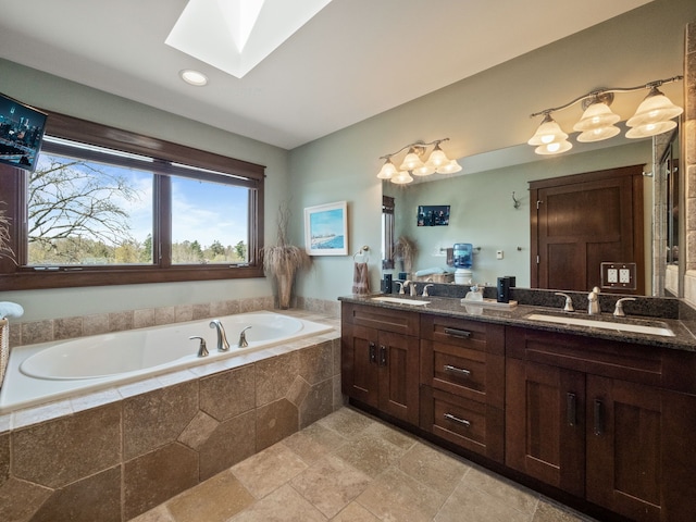 3190 Edgewood Park Dr, Commerce Twp, MI 48382 - full bath with a garden tub, a sink, double vanity, and a skylight