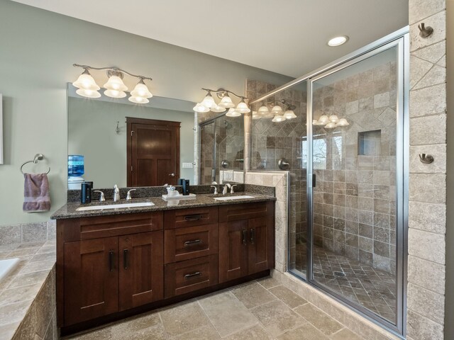 3190 Edgewood Park Dr, Commerce Twp, MI 48382 - bathroom featuring a sink, a stall shower, and double vanity