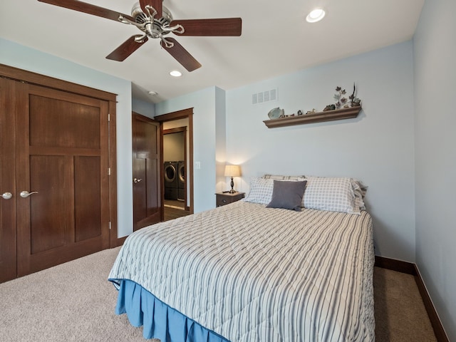 3190 Edgewood Park Dr, Commerce Twp, MI 48382 - bedroom featuring carpet floors, recessed lighting, visible vents, washer and clothes dryer, and a closet