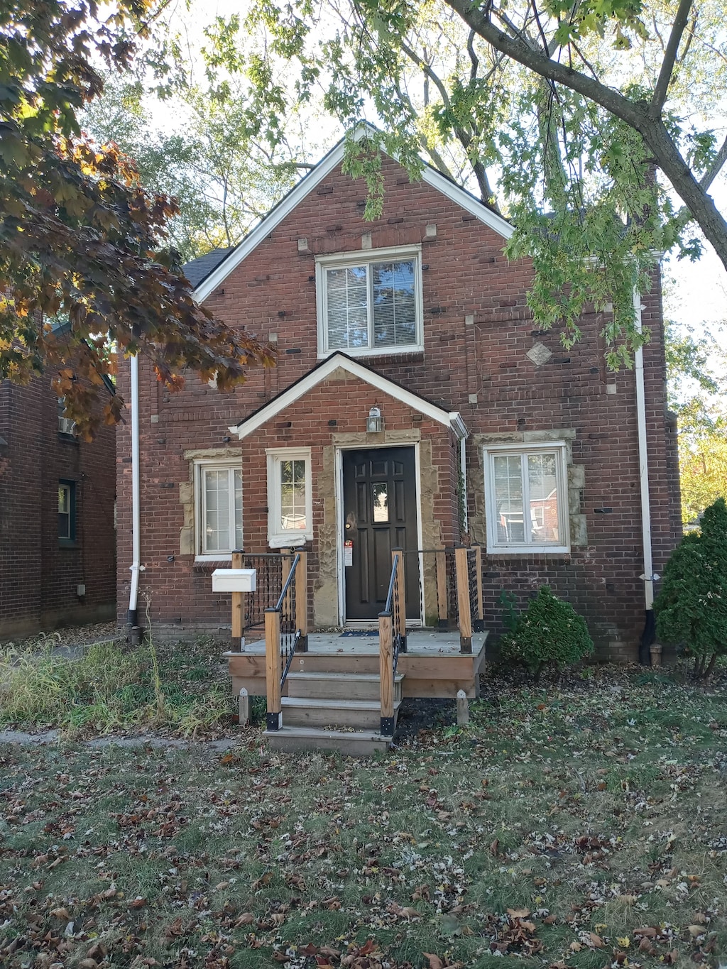 view of front of home with brick siding