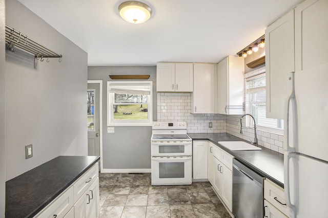 kitchen with a sink, open shelves, tasteful backsplash, white appliances, and dark countertops