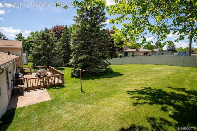 140 Indian Knolls St, Oxford, MI 48371 - view of yard with a wooden deck