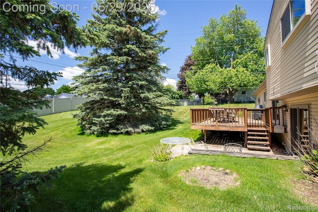 140 Indian Knolls St, Oxford, MI 48371 - view of yard featuring a deck