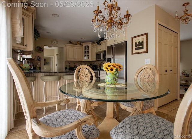 140 Indian Knolls St, Oxford, MI 48371 - dining room with a chandelier and light tile patterned flooring