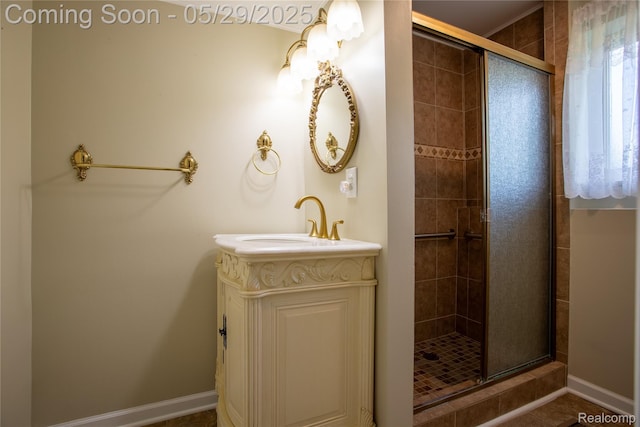 140 Indian Knolls St, Oxford, MI 48371 - bathroom featuring a shower stall, vanity, and baseboards