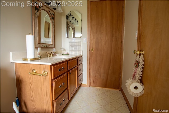 140 Indian Knolls St, Oxford, MI 48371 - bathroom with vanity, tile patterned floors, and baseboards