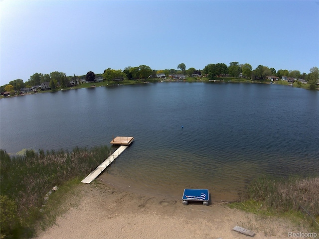 140 Indian Knolls St, Oxford, MI 48371 - water view featuring a dock
