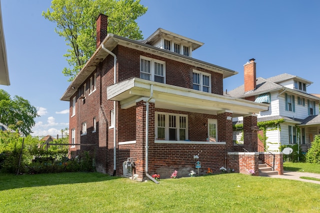 214 Worcester, Highland Park, MI 48203 - traditional style home with brick siding, a chimney, and covered porch