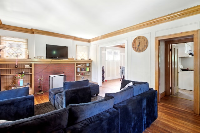 214 Worcester, Highland Park, MI 48203 - living area featuring crown molding, wood finished floors, a fireplace, and baseboards