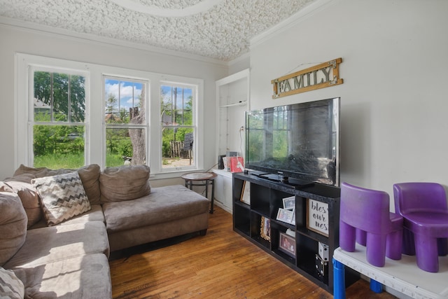 214 Worcester, Highland Park, MI 48203 - living room with crown molding, wood finished floors, and a textured ceiling