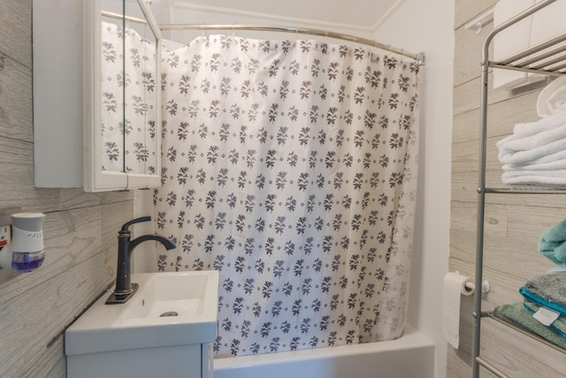 full bath featuring vanity and shower / tub combo with curtain