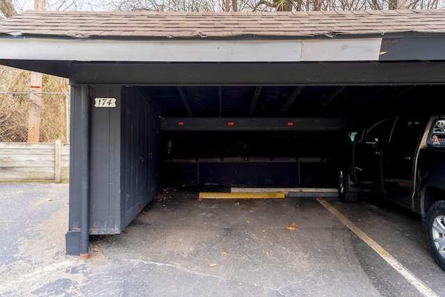 garage featuring fence
