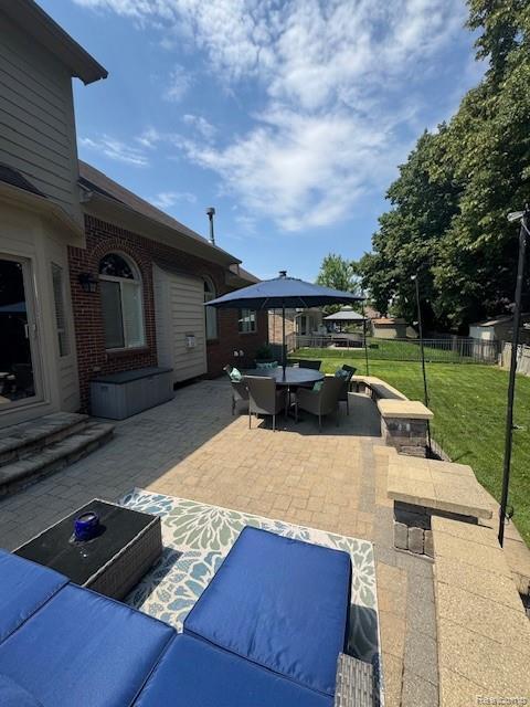 8535 Lillian Dr, Washington, MI 48094 - view of patio featuring outdoor dining area