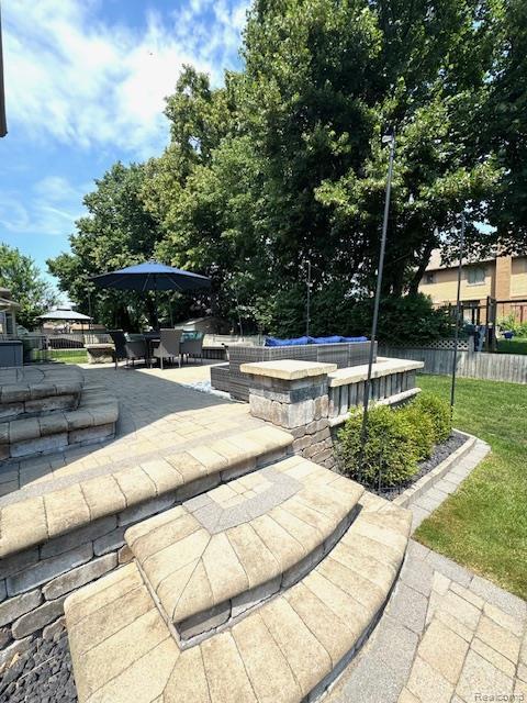 8535 Lillian Dr, Washington, MI 48094 - view of community featuring a patio area and a pool