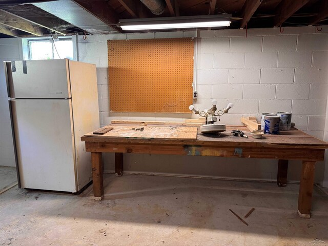 2408 N Mason St, Saginaw, MI 48602 - below grade area featuring freestanding refrigerator