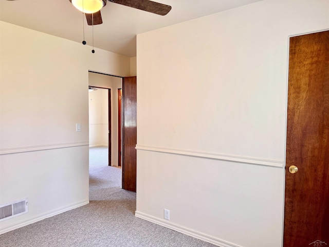 2408 N Mason St, Saginaw, MI 48602 - carpeted spare room featuring a ceiling fan and baseboards