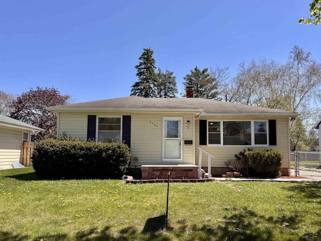 2408 N Mason St, Saginaw, MI 48602 - view of front facade featuring a chimney