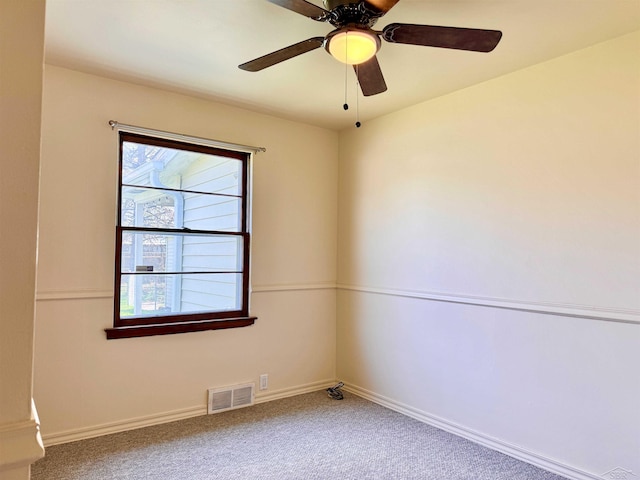 2408 N Mason St, Saginaw, MI 48602 - empty room with carpet flooring, baseboards, and ceiling fan