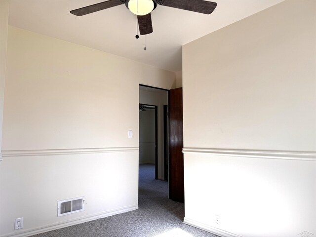 2408 N Mason St, Saginaw, MI 48602 - carpeted spare room featuring a ceiling fan and baseboards