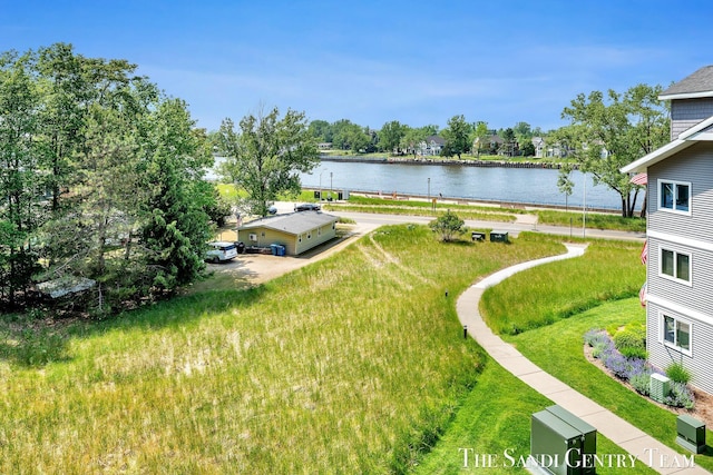 810 S Harbor Dr Unit 21, Grand Haven, MI 49417 - view of yard featuring a water view