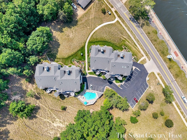 810 S Harbor Dr Unit 21, Grand Haven, MI 49417 - drone / aerial view of a pool area and a nearby body of water