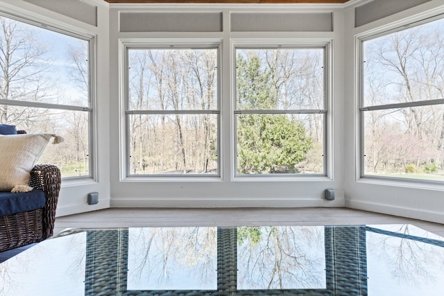 interior details with wood finished floors and baseboards