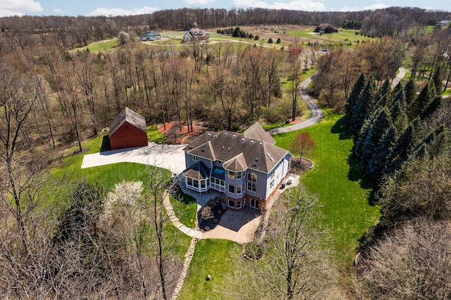 bird's eye view with a forest view