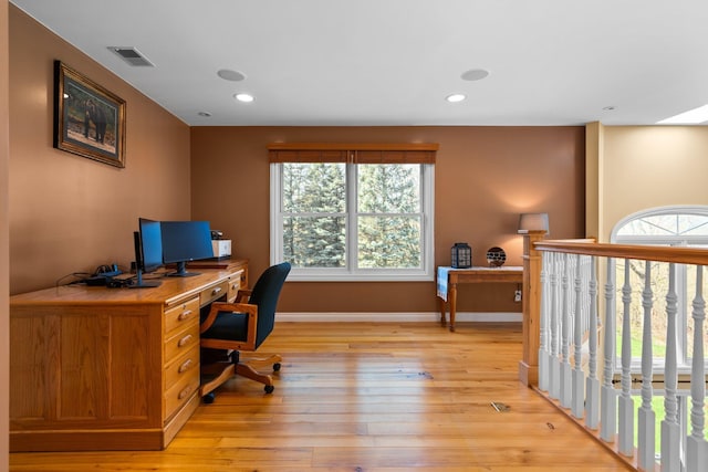 office featuring visible vents, recessed lighting, light wood-style flooring, and baseboards