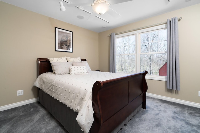 carpeted bedroom with baseboards