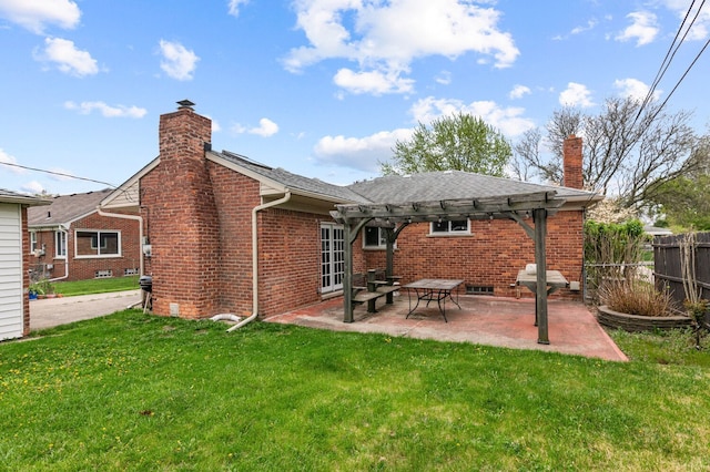 back of property with fence, a pergola, a chimney, and brick siding