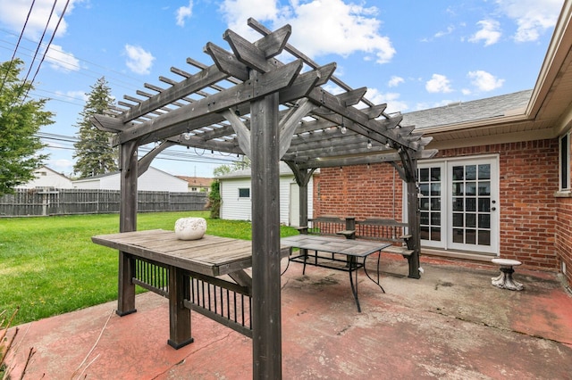 view of patio with a pergola, fence, and outdoor dining area