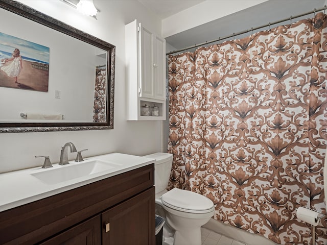 bathroom featuring toilet, tile patterned floors, a shower with shower curtain, and vanity