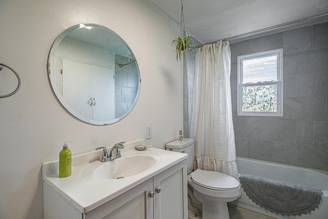 full bath featuring toilet, shower / bathtub combination with curtain, and vanity