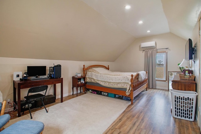 bedroom with lofted ceiling, wood finished floors, recessed lighting, and baseboards