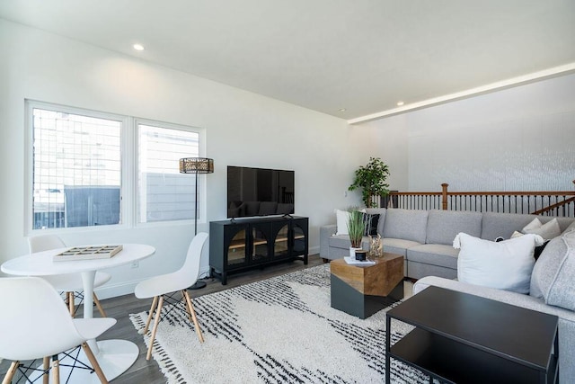 living room with recessed lighting and wood finished floors