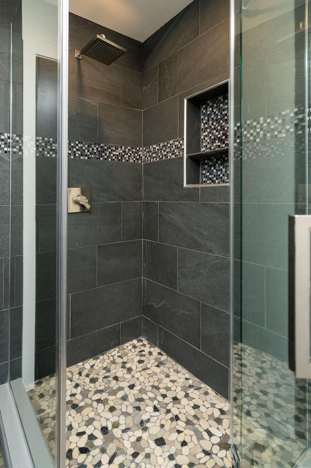 bathroom with a stall shower