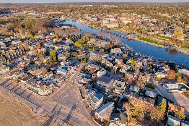 bird's eye view with a water view and a residential view